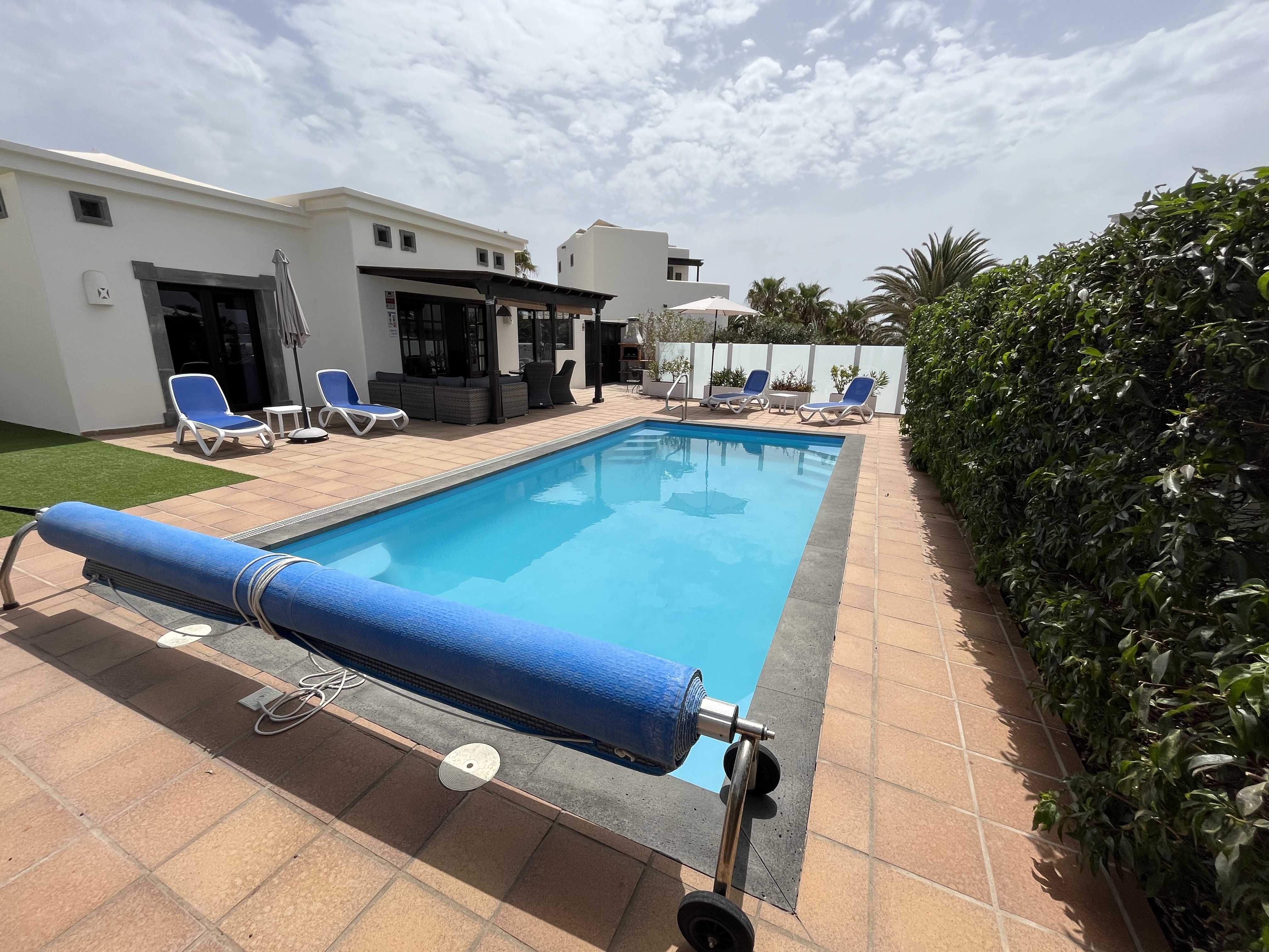 Astroturf area to the side of the villa)