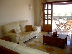 View across Lounge from Kitchen towards French Doors that lead to Terrace