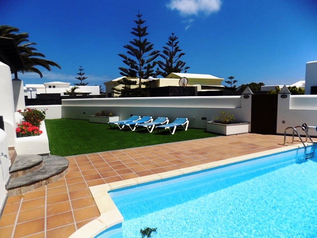 View across pool ; Astroturf Area in Rear