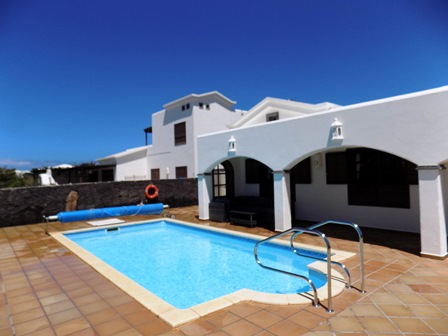 View across pool to arches
