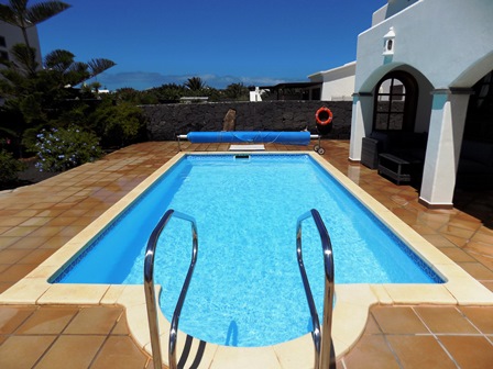 Another View across the pool - 2 bars to aide access to pool via Roman steps