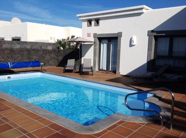 View across pool to the villa