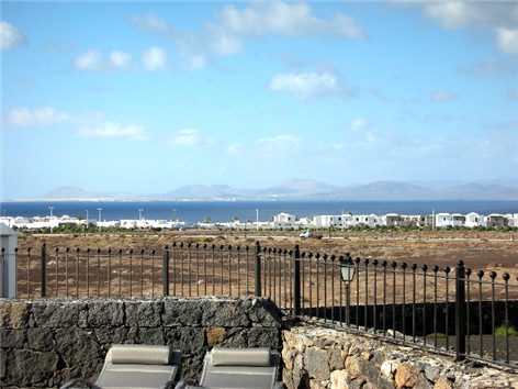 Terrace View towards Fuerterventura and Lobos ; Railings added to low level wall for additional Safety/Security