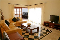 View across main Lounge towards French doors that lead to Pool/Terrace