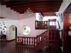 Stairs leading to upper lounge area
