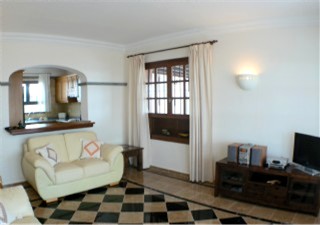 Lounge Area showing breakfast bar to kitchen