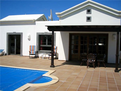 Shaded Pergola at doors of Lounge