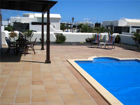 View across pool to enclosed gardens