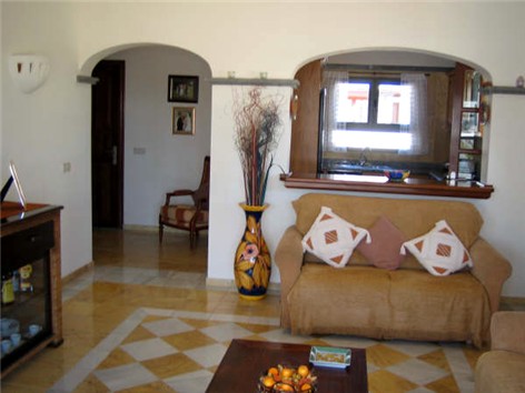 View of Lounge from French Doors towards breakfast bar / Kitchen