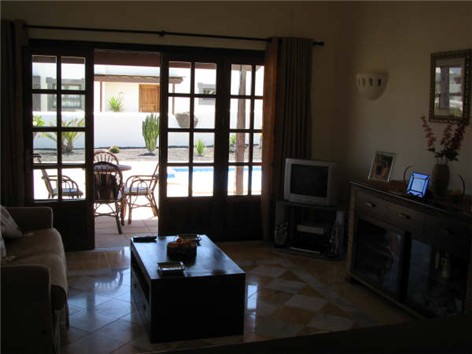 View across lounge towards french door